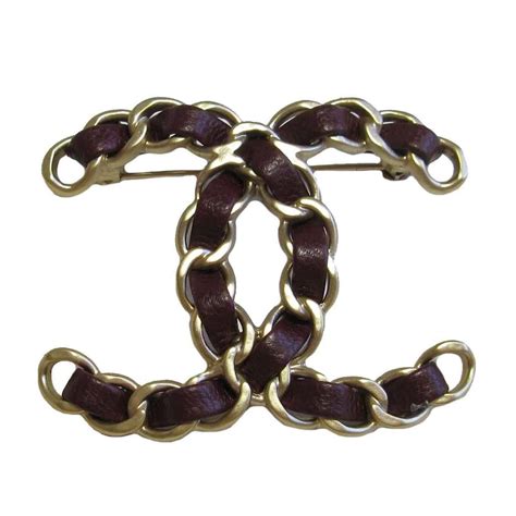 chanel brooch cc leather